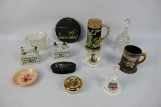 A group of ceramics and glassware. Lot includes an Asian decorative trinket box. A German mug.