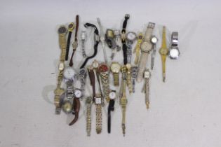 A collection of men's and women's wrist