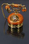 Estee Lauder - A boxed enamel Estee Lauder solid perfume compact in the form of a telephone.
