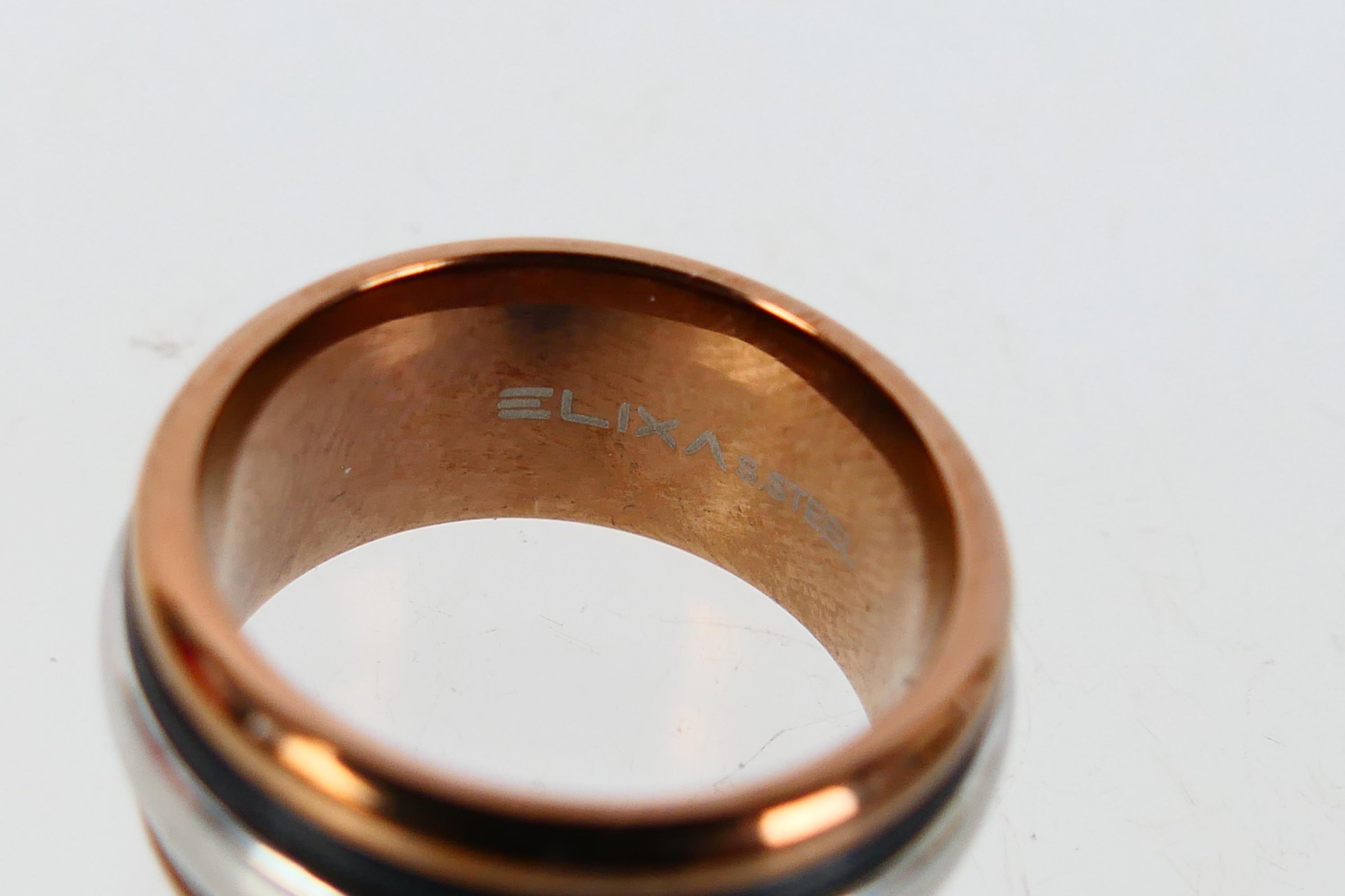 Swarovski, Elixa - A stainless steel Elixa rose gold coloured ring within a Swarovski box. - Image 3 of 4
