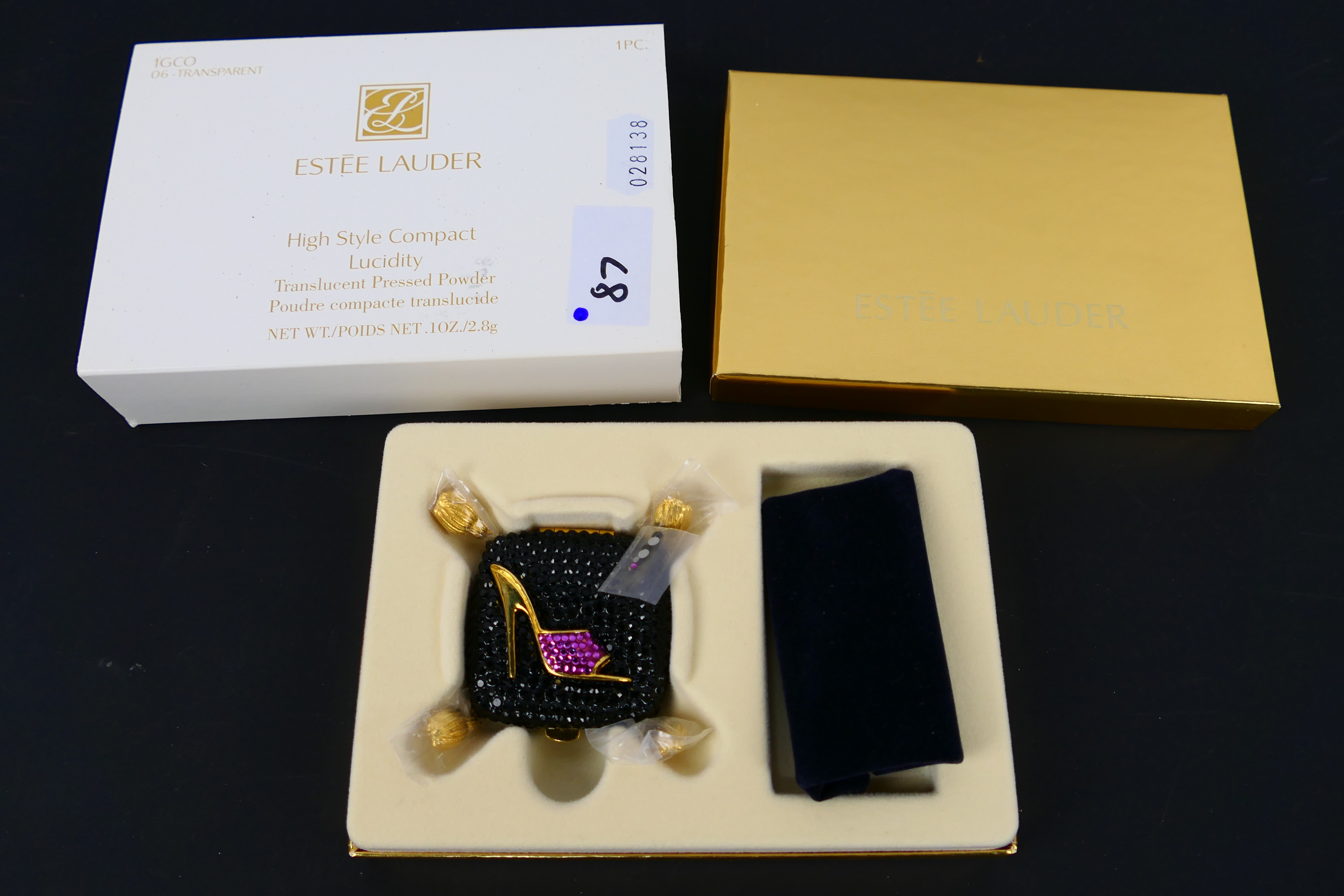 Estee Lauder - A boxed gilt metal Estee Lauder Sophisticated Lady Heel powder compact. - Image 7 of 7