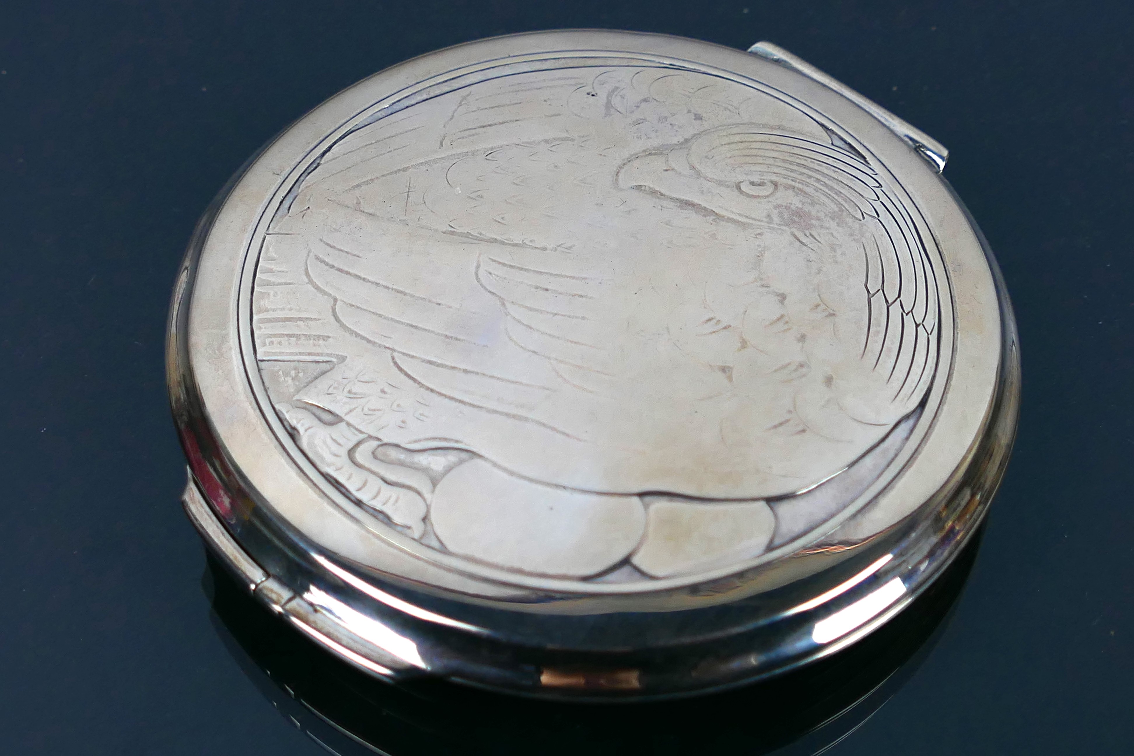 Georg Jensen - A circa 1945 Silver Compact with a bird of prey embossed design to the front of the - Image 2 of 7