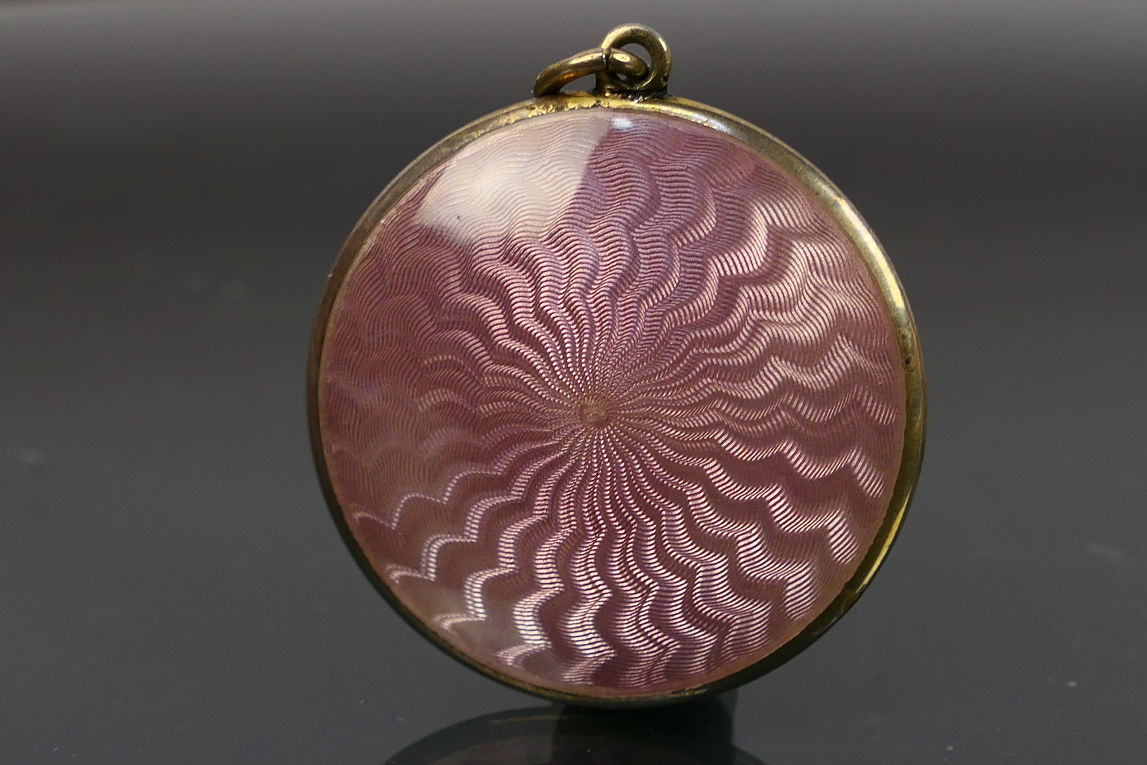 A miniature guilloche enamel powder compact, covered front and back in pale pink enamel. - Image 4 of 6