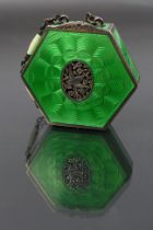 A Sterling Silver and guilloche enamel hexagonal powder compact with green enamel on all sides and