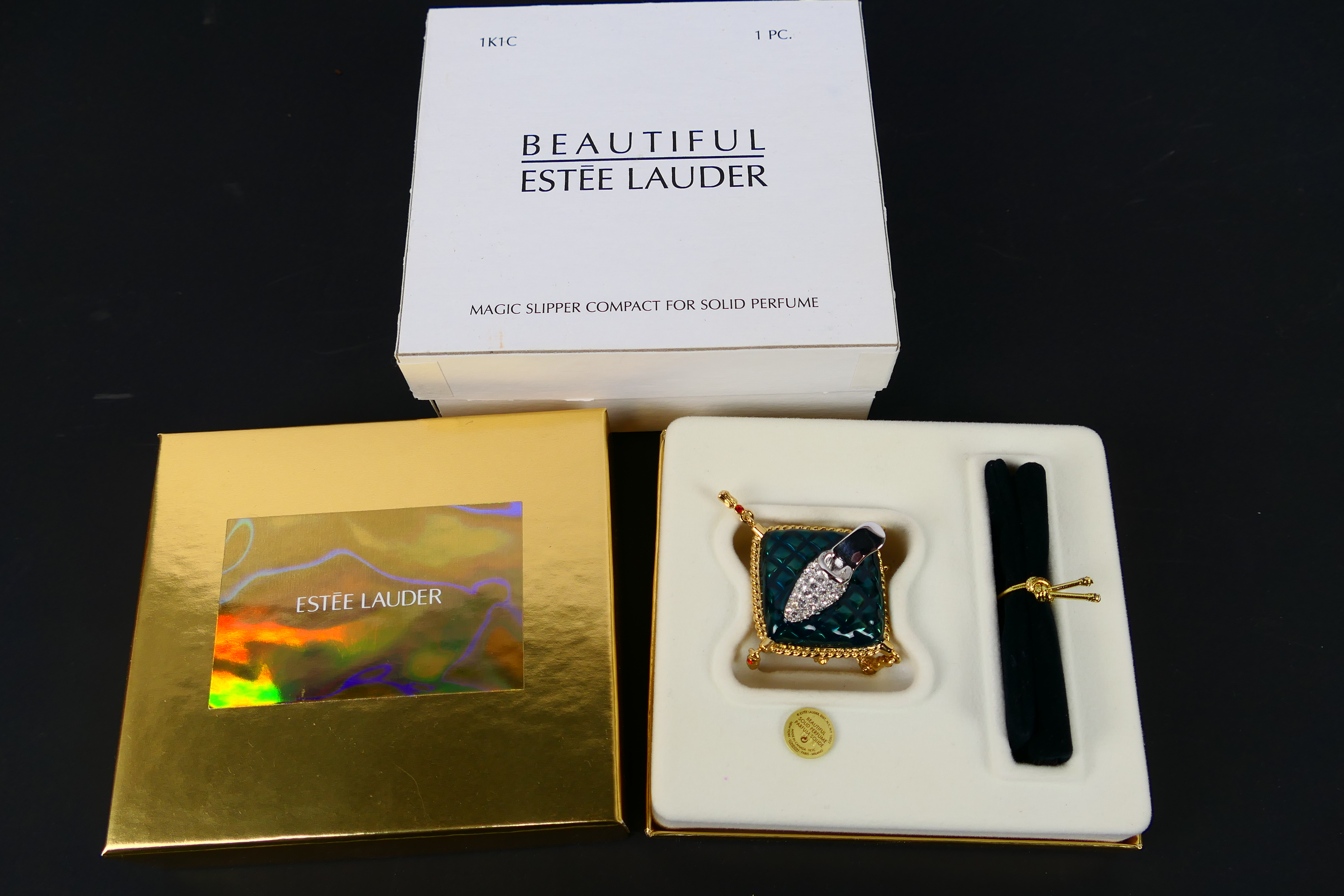 Estee Lauder - 2 x boxed gilt metal Estee Lauder solid perfume compacts - Lot includes a 2003 - Image 8 of 9