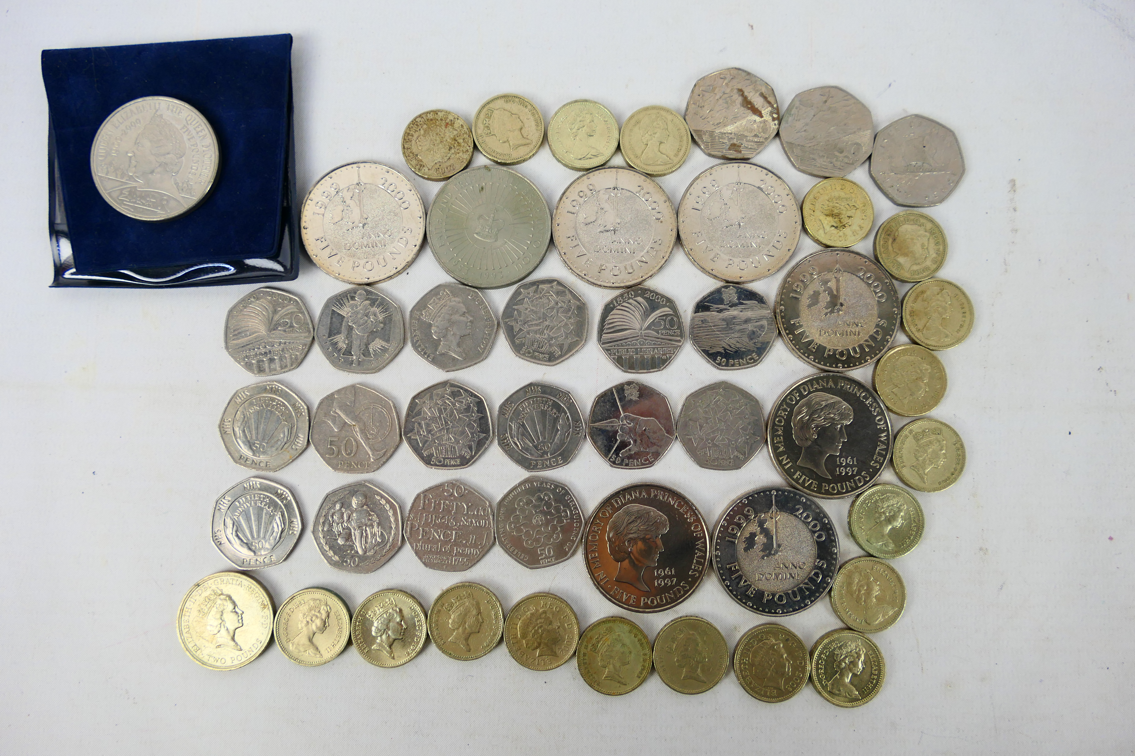 A collection of coins comprising £5 coin