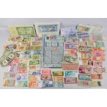 A collection of foreign banknotes and st