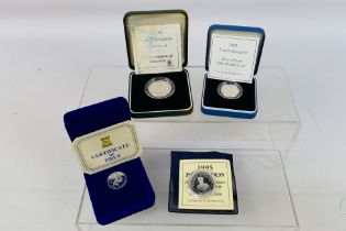 Four silver coins comprising a 1996 UK S