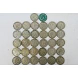 A collection of silver content One Florin and Two Shilling coins (500 fineness), George V and later,