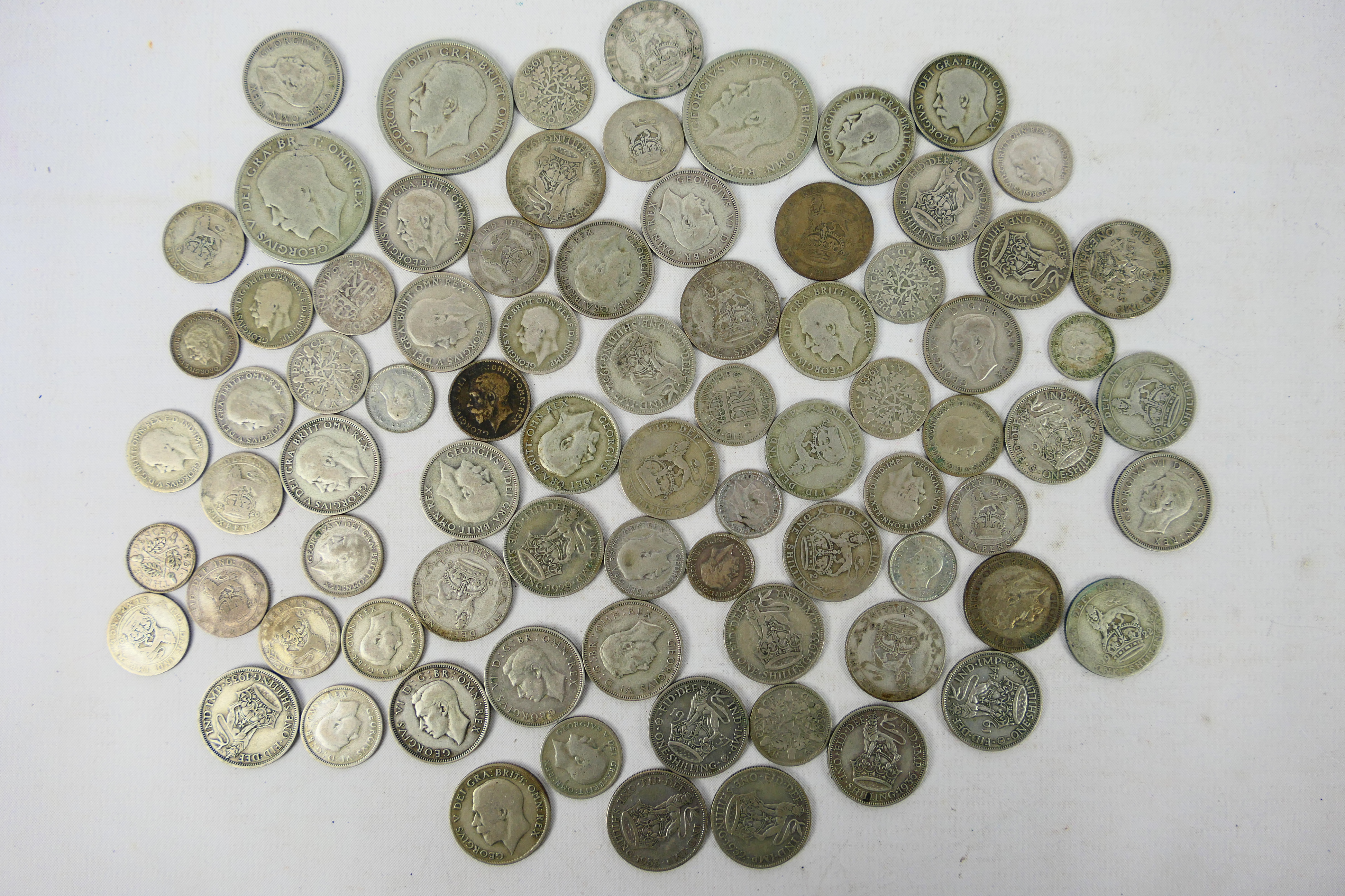 A collection of silver content coins (500 fineness), George V and later, approximately 358 grams.