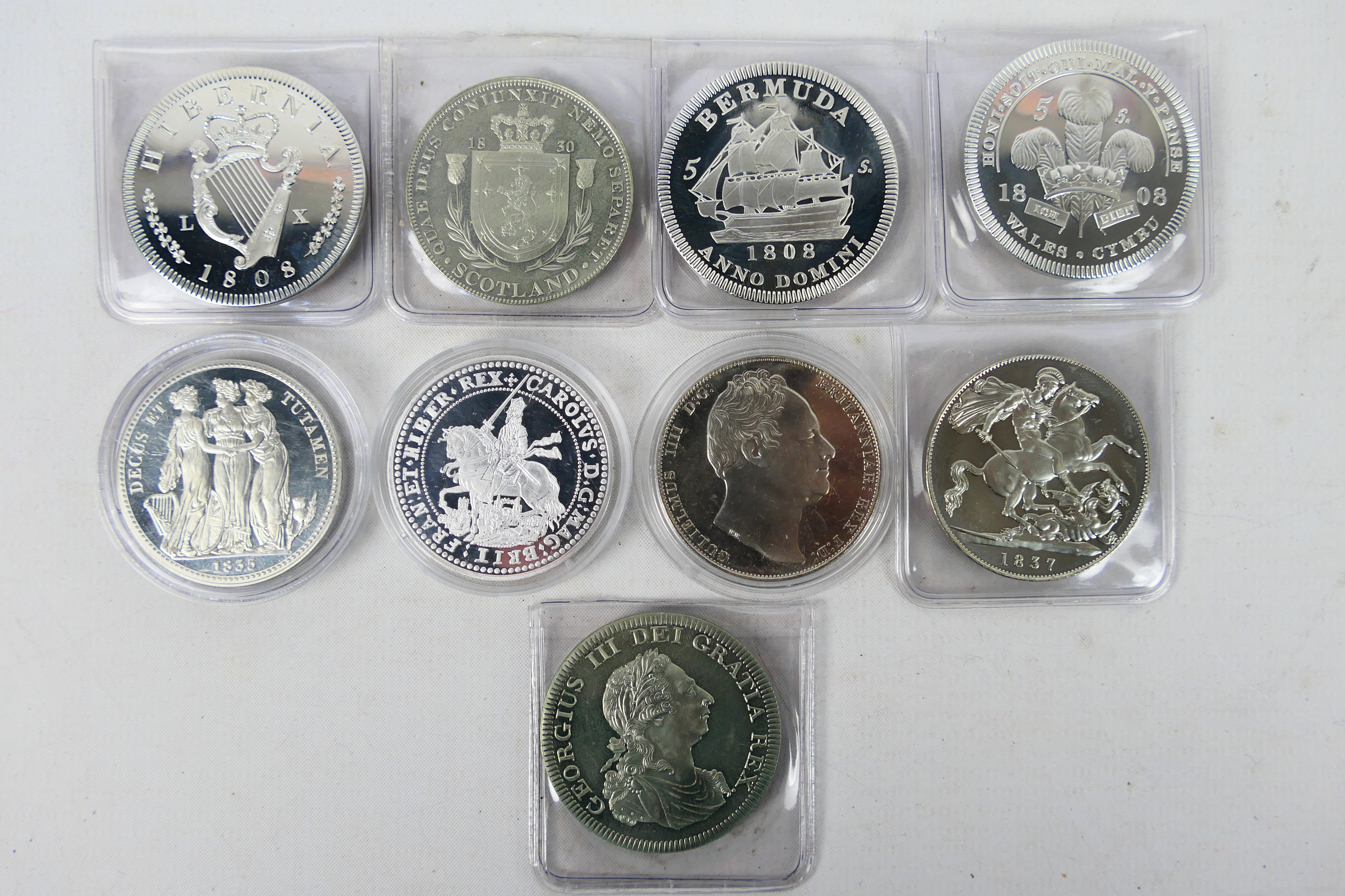 A collection of fantasy coins to include