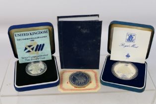 Silver Coins - Three cased silver coins