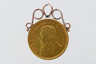 Gold Coin - A South African ½ Pond, 1896, with rose metal pendant mount, 4.5 grams.
