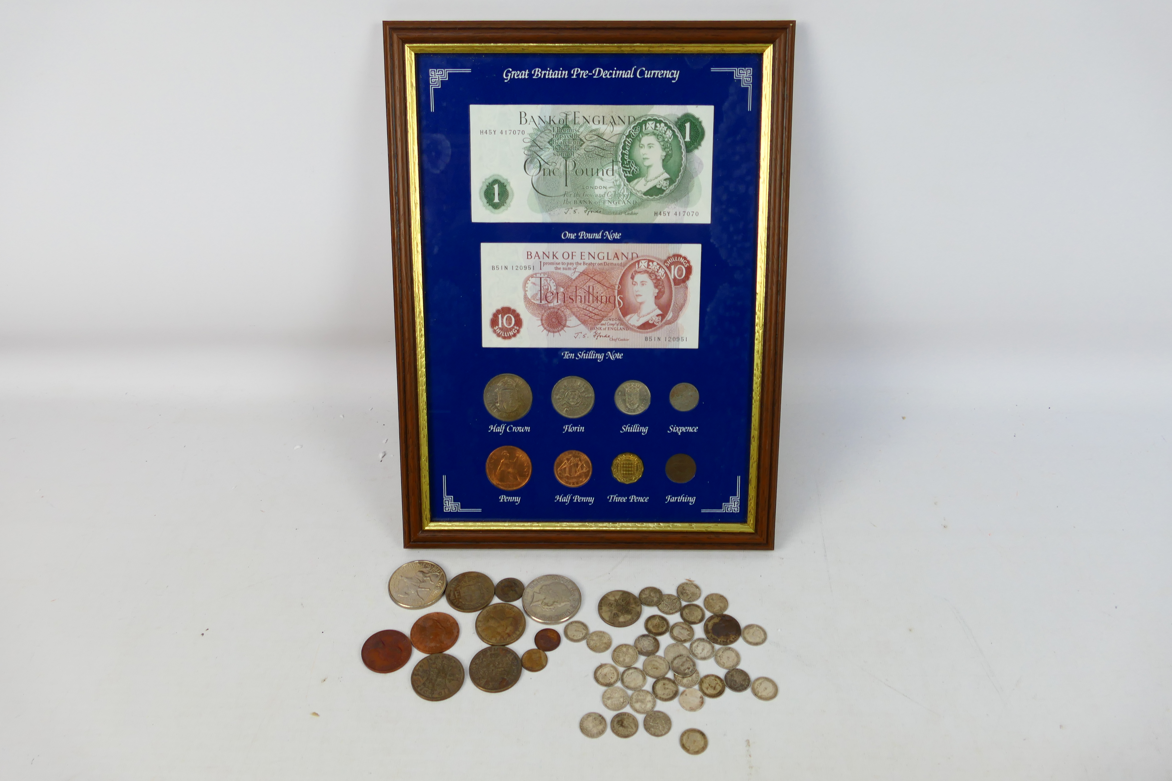 A framed display of Great Britain Pre-Decimal Currency,