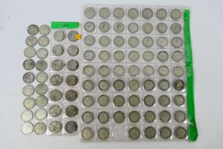 A collection of silver One Shilling coins (500 fineness), approximately 540 grams.