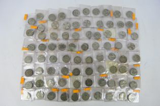 Silver Coins - A collection of florin and two shilling silver content coins,