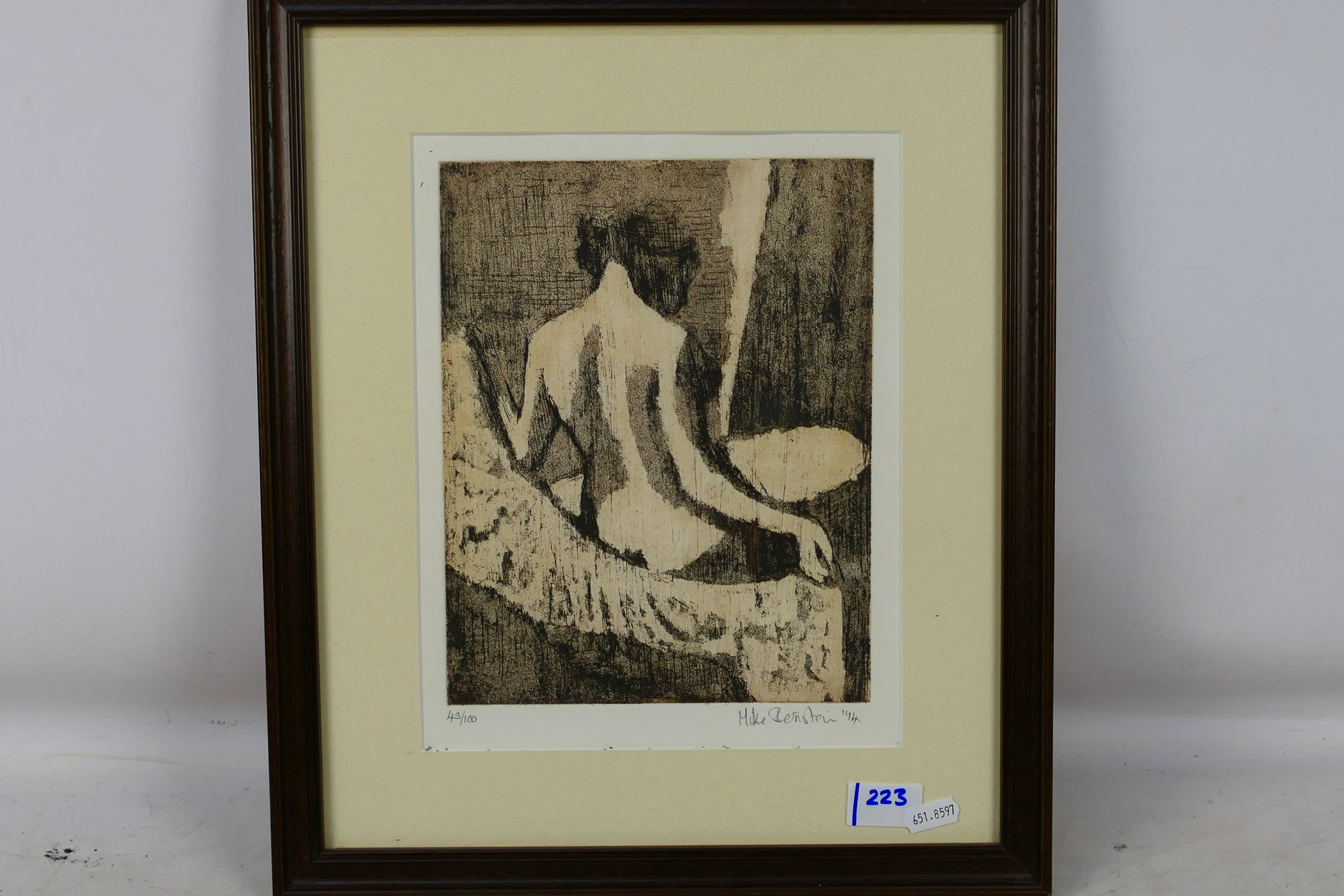 A limited edition etching depicting a female nude,