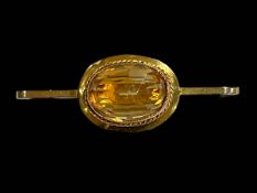 9 carat gold citrine bar brooch, 5cm across.