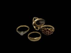 Diamond 18 carat gold and platinum ring and three 9 carat gold rings (4).