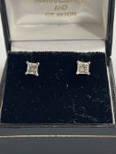 Diamond square cut 18 carat white gold ear studs.