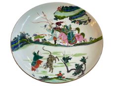 Chinese Famille Rose 'Water Margins' large dish, Qing Dynasty with six character mark to base,