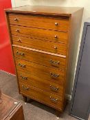 E. Gomme G Plan chest of eight drawers, 133cm by 66cm by 41cm.