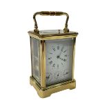 Good quality modern French four glass panel carriage clock, 17cm including handle.