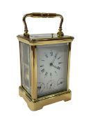 Good quality modern French four glass panel carriage clock, 17cm including handle.