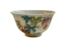 Chinese porcelain tea bowl with strawberry and butterfly decoration, blue seal mark to base,