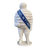 Cast metal model of The Michelin Man.