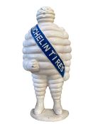 Cast metal model of The Michelin Man.