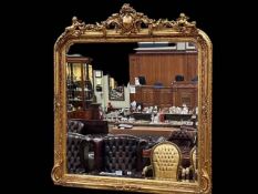 Large gilt framed bevelled overmantel mirror,