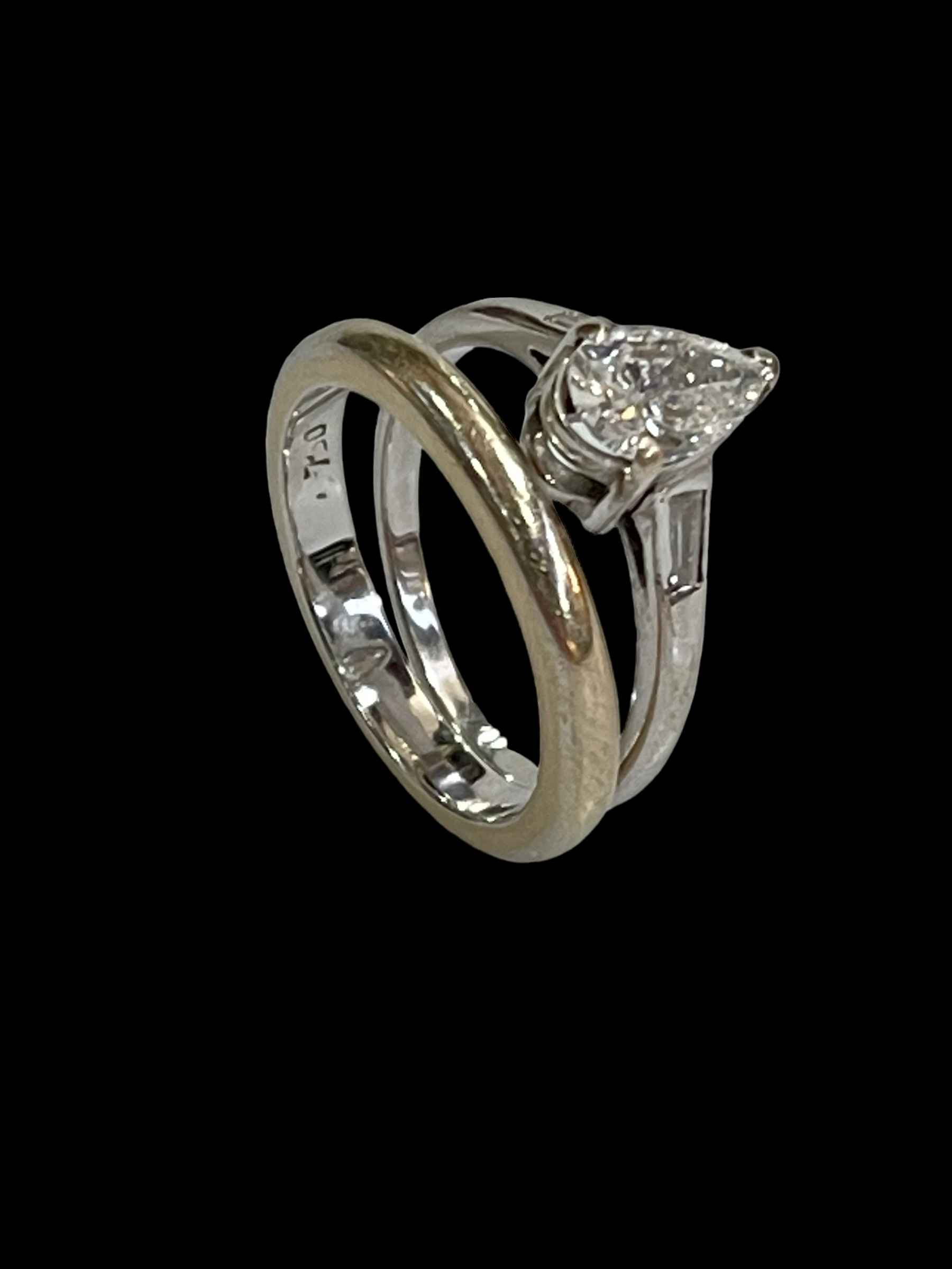 Diamond tear drop 18 carat white gold ring, size N, together with 18 carat white gold wedding band,