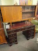 Mahogany eight drawer pedestal desk, 76cm by 122cm by 61cm,