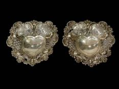 Pair of Victorian embossed and pierced silver bon bon dishes by Joseph Heming, London 1894.