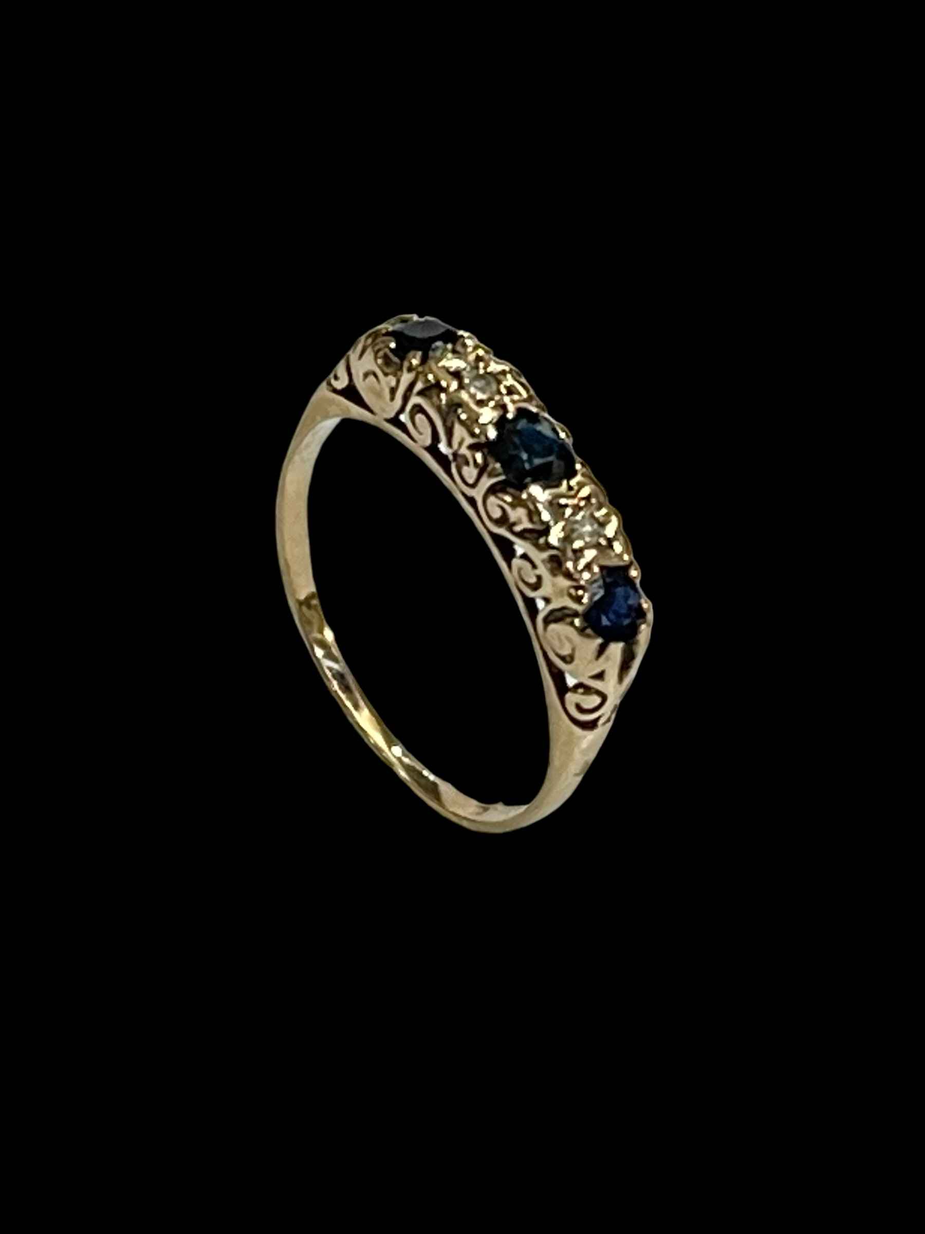Sapphire and diamond gold ring, size O.