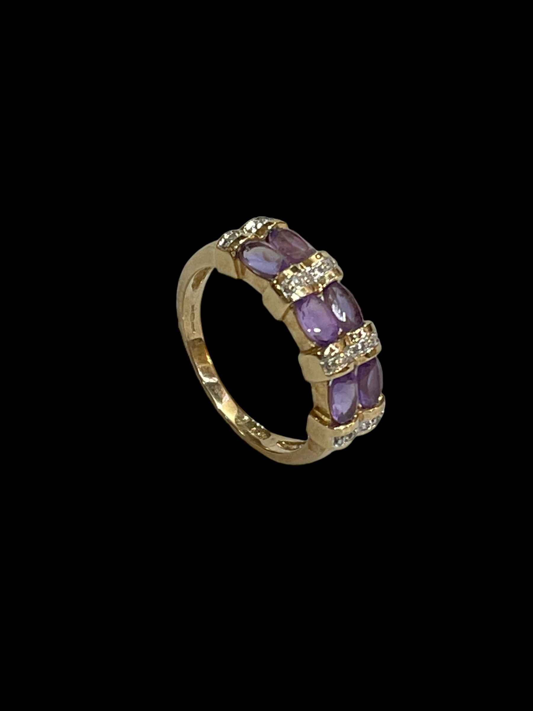 Amethyst and diamond 9 carat gold ring, size O.