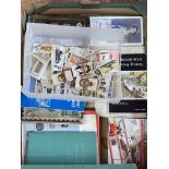 Box of cigarette cards in albums and loose.