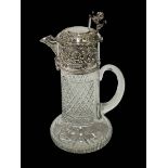 Handsome EP mounted crystal claret jug with cherub reliefs.