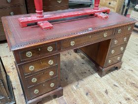 Late 19th/early 20th Century mahogany nine drawer pedestal desk, 75.5cm by 137cm by 73cm.