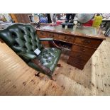 Mahogany and line inlaid eight drawer pedestal desk with green and gilt tooled leather inset top,