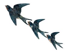 Set of three Beswick Swallows in flight.