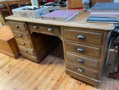 Early 20th Century oak double sided partners desk having nine drawers to front and reverse,