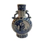 Small Chinese blue and white moon flask vase decorated with figure in garden scene,