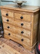 Waxed pine chest of two short above three long drawers, 98cm by 103cm by 44cm.