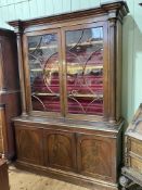 Victorian mahogany cabinet bookcase having two glazed panel doors enclosing adjustable shelves
