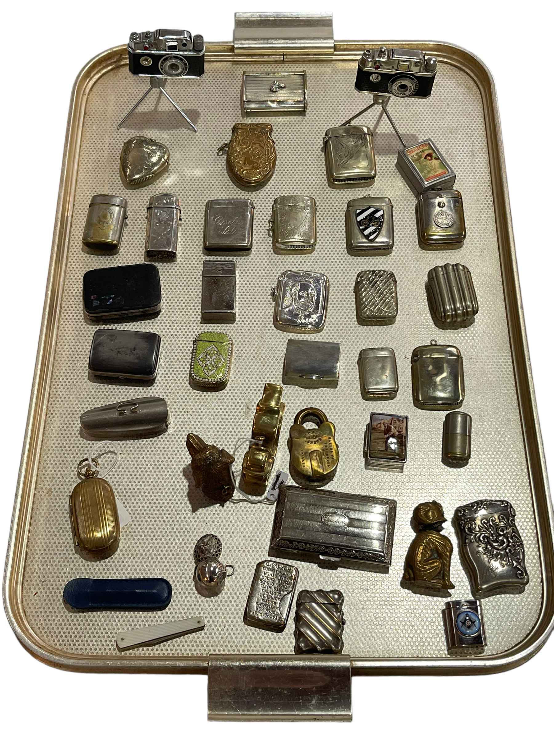 Collection of novelty and other vesta cases, two novelty camera lighters, etc.
