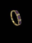 Amethyst and diamond 18 carat gold ring, size N.