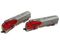 Two Lionel Corporation New York models of Santa Fe Diesel Locomotives.