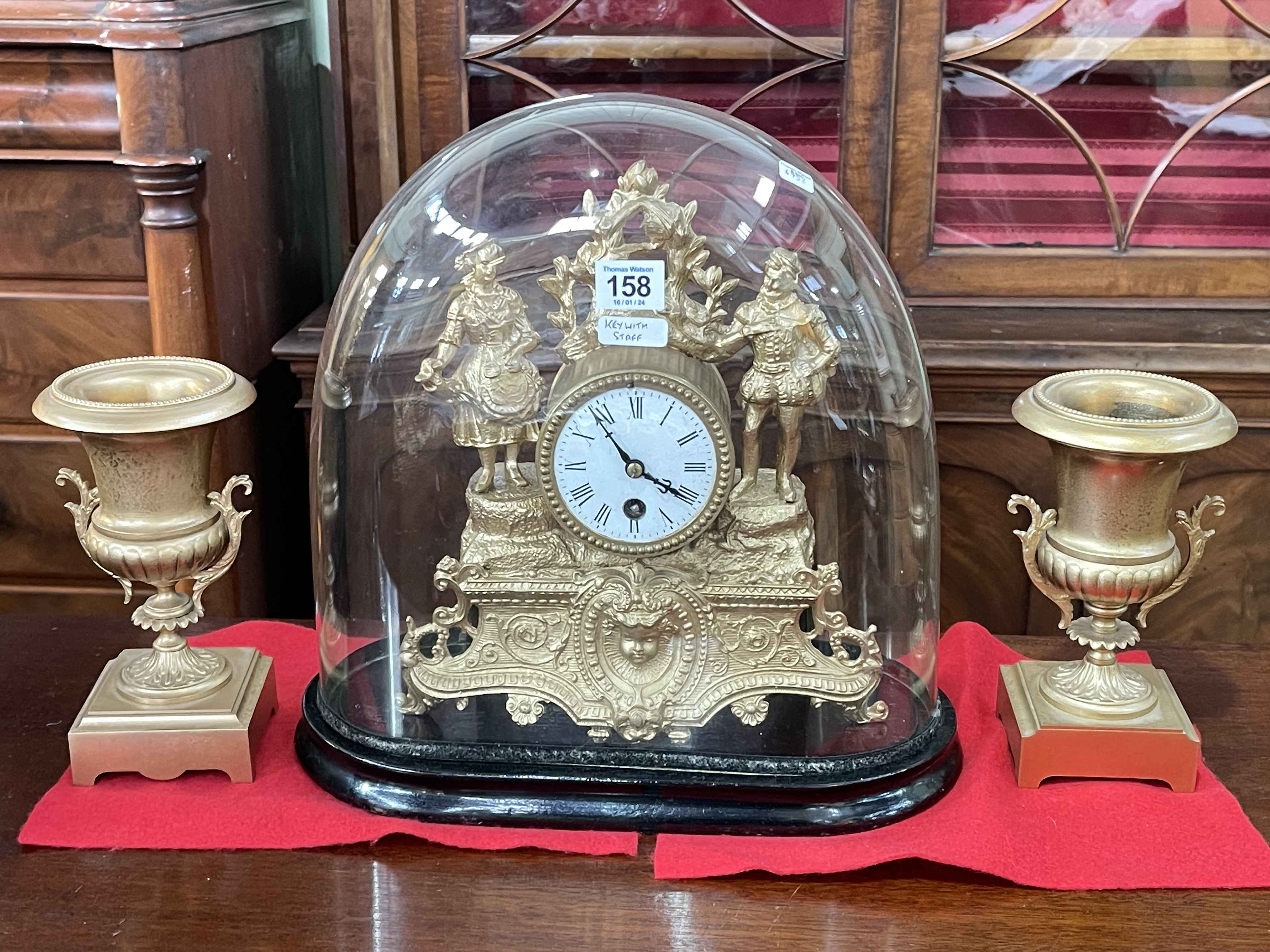 Ornate gilt clock (under dome) garniture set, clock 34cm.